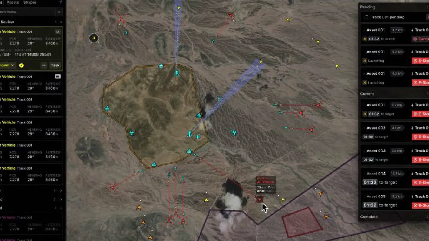 Command-and-control interface over a satellite map with assets and tracking panels